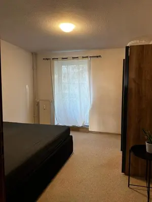 Ein Bett oder Betten in einem Zimmer der Unterkunft Hansestraße