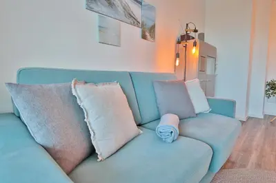 Ein Sitzbereich in der Unterkunft Haus Meeresstrand Appartement 