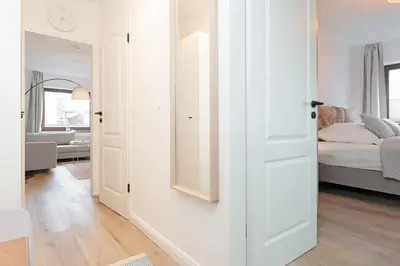 Ein Bett oder Betten in einem Zimmer der Unterkunft Seestraße 24 Seamaster