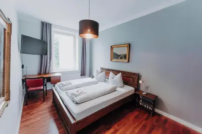 Ein Bett oder Betten in einem Zimmer der Unterkunft Apartments im Herzen Lübecks