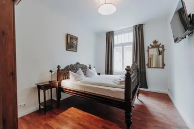 Ein Bett oder Betten in einem Zimmer der Unterkunft Apartments im Herzen Lübecks