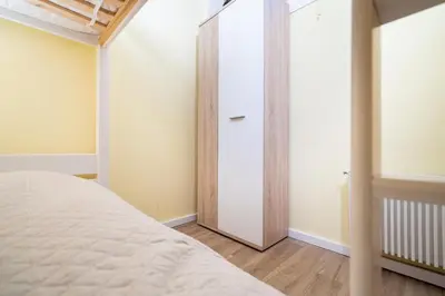 Ein Bett oder Betten in einem Zimmer der Unterkunft Ferienpark Sierksdorf App 241
