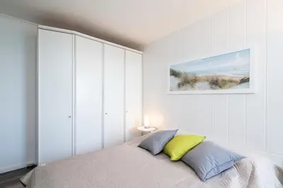 Ein Bett oder Betten in einem Zimmer der Unterkunft Ferienpark Sierksdorf App 529