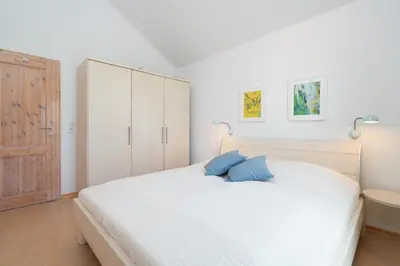 Ein Bett oder Betten in einem Zimmer der Unterkunft Strandpark Sierksdorf H088