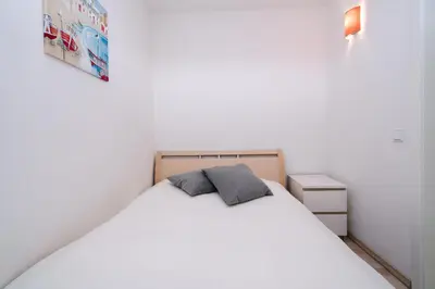 Ein Bett oder Betten in einem Zimmer der Unterkunft Ferienpark Sierksdorf App 224