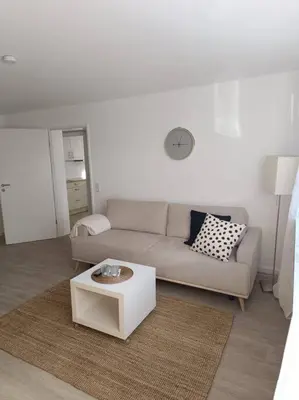 Ein Sitzbereich in der Unterkunft Strandnahe Ferienwohnung