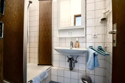 Ein Badezimmer in der Unterkunft Villa Wilhelma Strandallee 146 Villa Wilhema Apartment 5