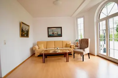 Ein Sitzbereich in der Unterkunft Villa Wilhelma Strandallee 146 Villa Wilhelma Apartment 2