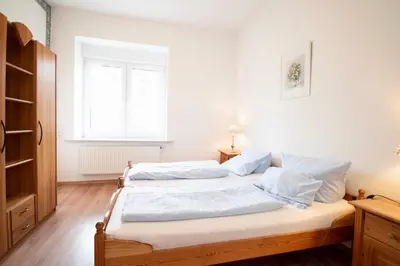 Ein Bett oder Betten in einem Zimmer der Unterkunft Villa Wilhelma Strandallee 146 Villa Wilhelma Apartment 2