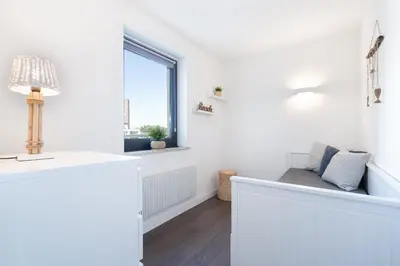 Ein Bett oder Betten in einem Zimmer der Unterkunft Ferienpark Sierksdorf App 388