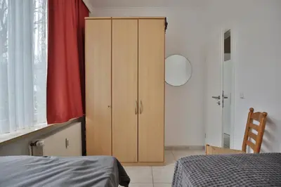 Ein Bett oder Betten in einem Zimmer der Unterkunft Die Insel Appartement 19