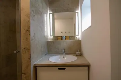 Ein Badezimmer in der Unterkunft Ocean Club