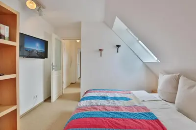 Ein Bett oder Betten in einem Zimmer der Unterkunft Hansa Residenz II Hansa-Residenz II Appartement 31