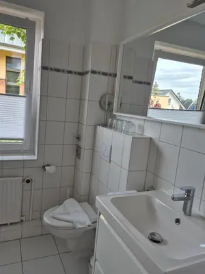 Ein Badezimmer in der Unterkunft FeWo Machedanz strandnah Timmendorf Strand