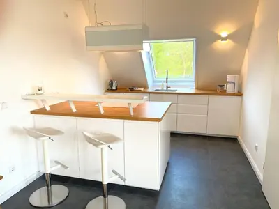Küche/Küchenzeile in der Unterkunft Timmenhus - Ferienwohnungen an der Ostsee