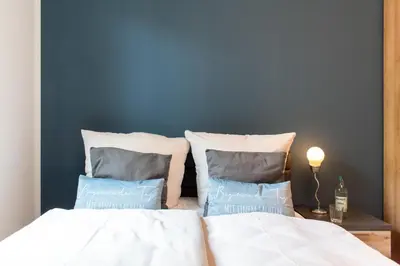 Ein Bett oder Betten in einem Zimmer der Unterkunft Ferienhaus Westside Niendorf