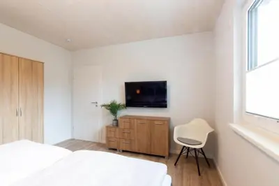 TV/Unterhaltungsangebot in der Unterkunft Ferienhaus Westside Niendorf