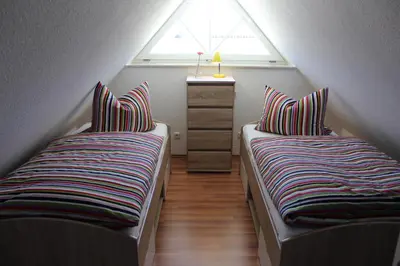 Ein Bett oder Betten in einem Zimmer der Unterkunft Haus Schwalbennest