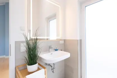 Ein Badezimmer in der Unterkunft MEI11 Ferienwohung Küstelodge