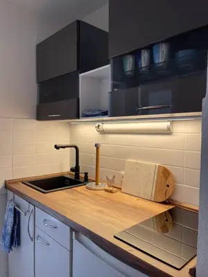Küche/Küchenzeile in der Unterkunft Ferienwohnung Strandoase inklusive Terrasse und Parkplatz - Sonnenseite