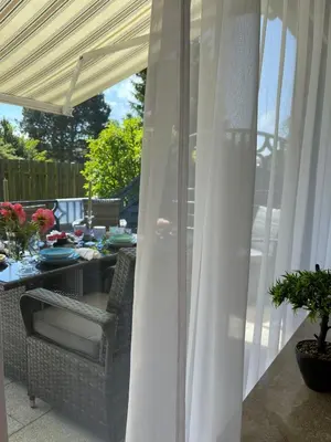 Ein Sitzbereich in der Unterkunft Ferienwohnung Strandoase inklusive Terrasse und Parkplatz - Sonnenseite