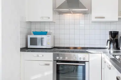 Küche/Küchenzeile in der Unterkunft Ferienwohnung Moderne Brise Scharbeutz