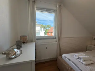 Ein Bett oder Betten in einem Zimmer der Unterkunft Ocean Escape - Teil der HolidayEscapes Kollektion