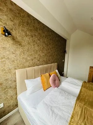 Ein Bett oder Betten in einem Zimmer der Unterkunft Luxus-Oase zwischen Ostsee und Lübeck