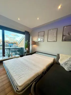 Ein Bett oder Betten in einem Zimmer der Unterkunft Ferienwohnung Strandperle - nur 150m zum Strand