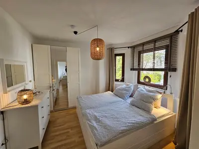 Ein Bett oder Betten in einem Zimmer der Unterkunft Ferienwohnung Raphael Timmendorfer Strand Gorch-Fock-Straße