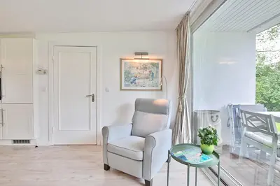 Ein Sitzbereich in der Unterkunft Ferienbungalow an der Göschbeek Ferienbungalow Meeresbrise