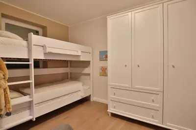 Ein Bett oder Betten in einem Zimmer der Unterkunft Residenz am Kurpark Appartement 2