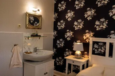 Ein Bett oder Betten in einem Zimmer der Unterkunft Ferienwohnung LOTTTALEBEN