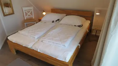 Ein Bett oder Betten in einem Zimmer der Unterkunft Seeblick