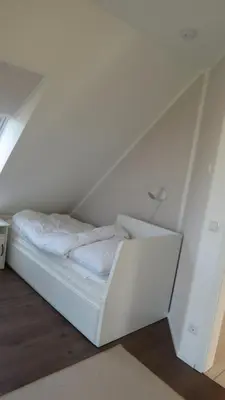 Ein Bett oder Betten in einem Zimmer der Unterkunft Seeblick