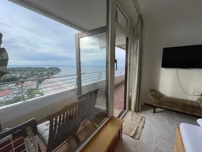 TV/Unterhaltungsangebot in der Unterkunft Beachside 2-Zimmer-Wohnung mit Meerblick