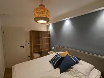Ein Bett oder Betten in einem Zimmer der Unterkunft Ruhige Terrassenwohnung in Strandnähe Sierksdorf für bis zu 4 Personen
