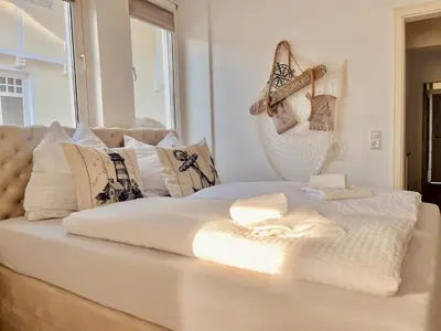 Ein Bett oder Betten in einem Zimmer der Unterkunft Kuestenliebe von OstseeAhoi