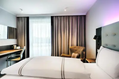 Ein Bett oder Betten in einem Zimmer der Unterkunft Premier Inn Lübeck City Centre