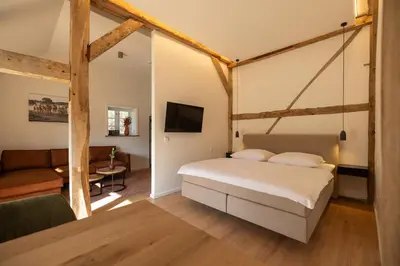 Ein Bett oder Betten in einem Zimmer der Unterkunft Reethus 22 Loft 1