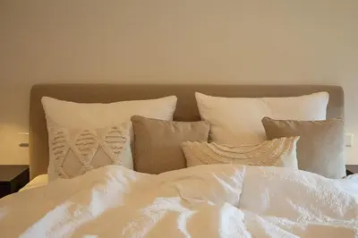 Ein Bett oder Betten in einem Zimmer der Unterkunft Reethus 22 Loft 4