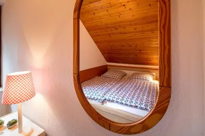 Ein Bett oder Betten in einem Zimmer der Unterkunft Fewo Knurrhahn 3/1 Haffkrug