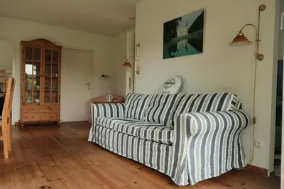 Ein Sitzbereich in der Unterkunft Lütt Haffhus - Haffkrug