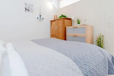 Ein Bett oder Betten in einem Zimmer der Unterkunft Panoramic NiNis Mupfel