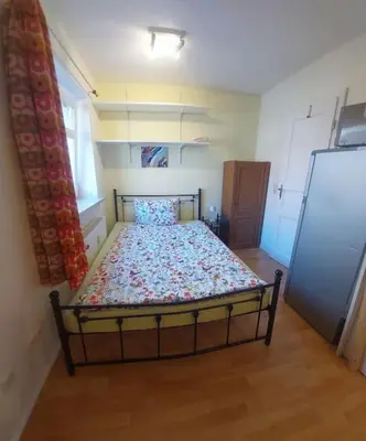 Ein Bett oder Betten in einem Zimmer der Unterkunft Wo die Fledermaus fliegt, die zweite