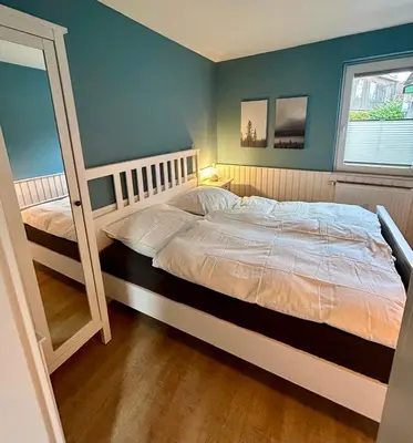 Ein Bett oder Betten in einem Zimmer der Unterkunft Smilla