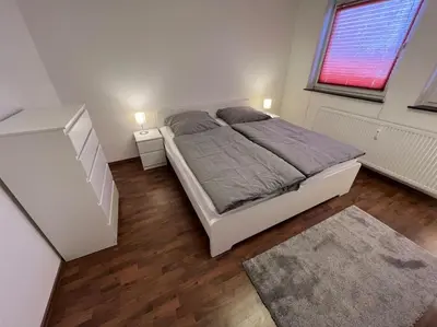 Ein Bett oder Betten in einem Zimmer der Unterkunft Über den Dächern der Hansestadt