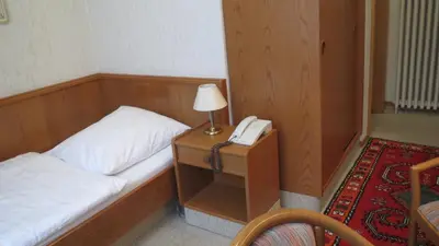 Ein Bett oder Betten in einem Zimmer der Unterkunft Pension Thiel