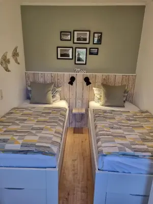 Ein Bett oder Betten in einem Zimmer der Unterkunft Strandapartment May