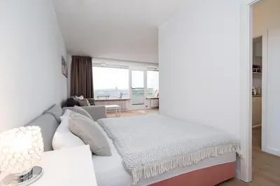 Ein Bett oder Betten in einem Zimmer der Unterkunft Ferienpark Sierksdorf App 797
